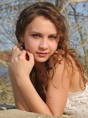 Perfect brunette loves sand